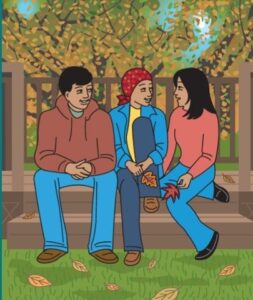 Three family members sitting together outdoors and talking