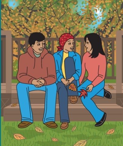 Three family members sitting together outdoors and talking
